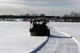 snowmobile trail grooming first pass on open field